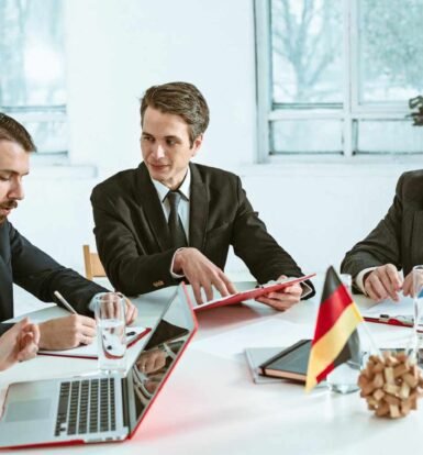 Legal professionals discussing case management strategies using the Best CRM for Law Firms 2025 to improve efficiency and client communication.