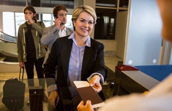 Immigration lawyer assisting clients efficiently at a reception desk.