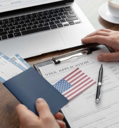 Visa application and supporting documents on a desk—ensuring H-1B petition signature requirements are met for USCIS compliance.