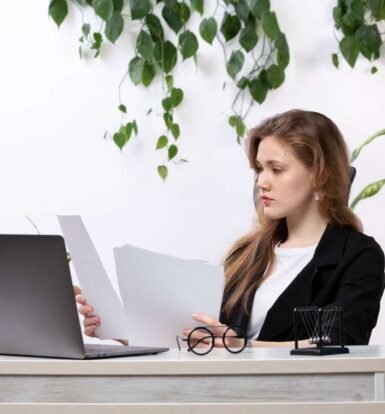 Immigration paralegal reviewing visa petition documents to ensure accuracy and compliance for USCIS approval.