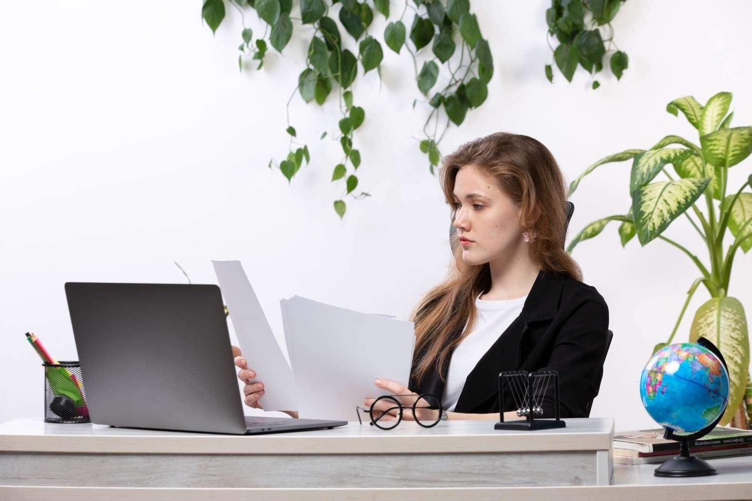 Immigration paralegal reviewing visa petition documents to ensure accuracy and compliance for USCIS approval.