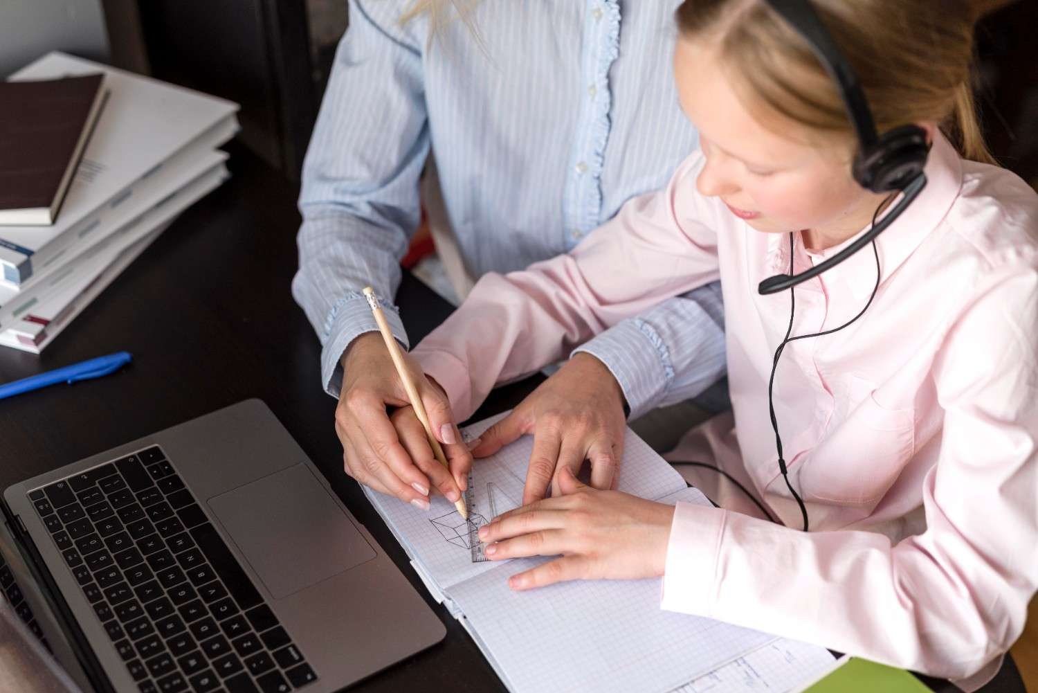 A virtual paralegal assisting with document tracking on a laptop, ensuring accurate USCIS premium processing case management.