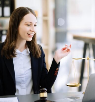 Smiling female attorney using a Virtual Legal Assistant for H-1B and DV Lottery applications, improving efficiency and workflow.