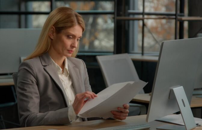 Immigration Attorney Reviewing Case Documents | Virtual Legal Assistant Support